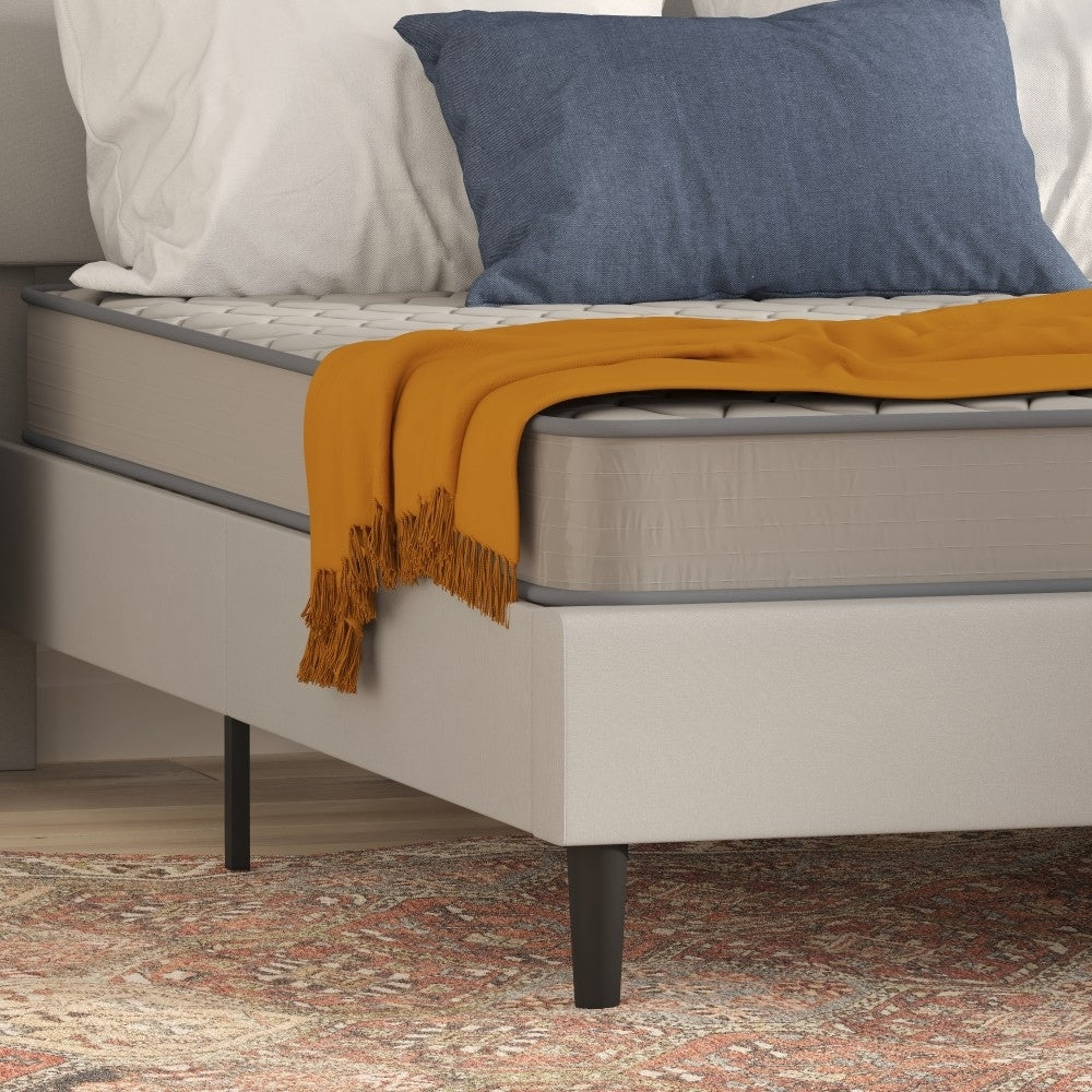 Matelas hybride à ressorts et plateau moyen