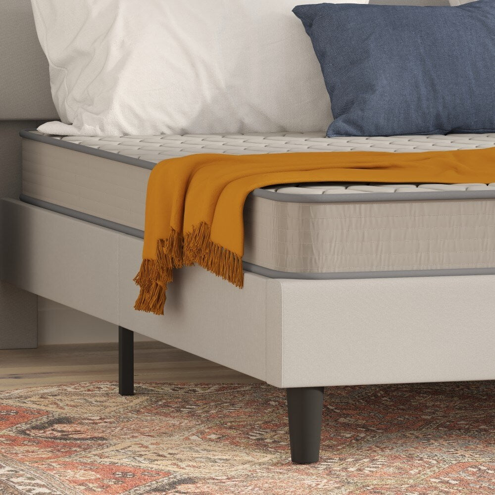 Matelas hybride à ressorts et plateau moyen