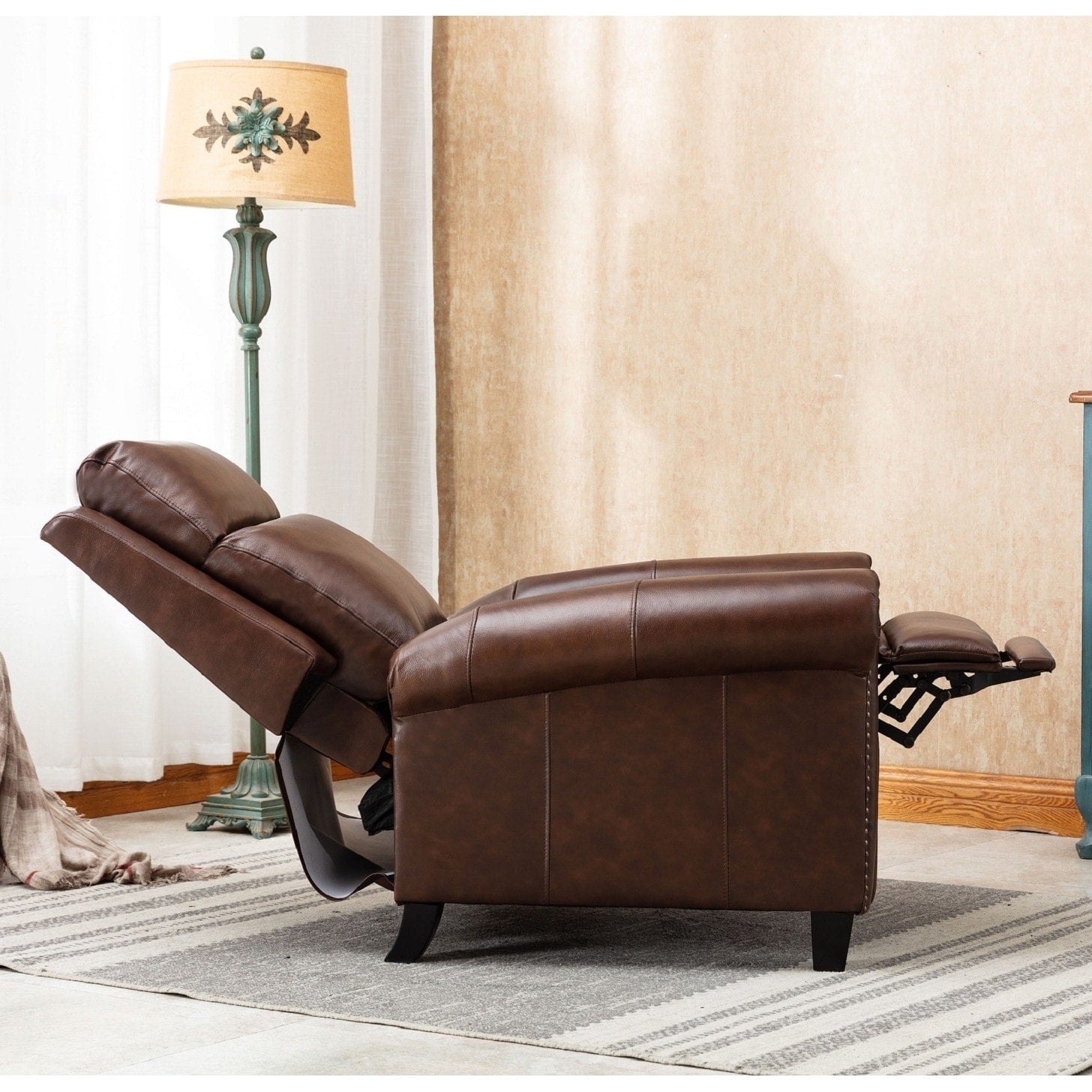 Fauteuil inclinable en cuir véritable avec accoudoirs et dossier confortables