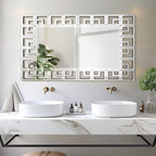 Grand miroir mural décoratif avec cadre géométrique aux accents argentés