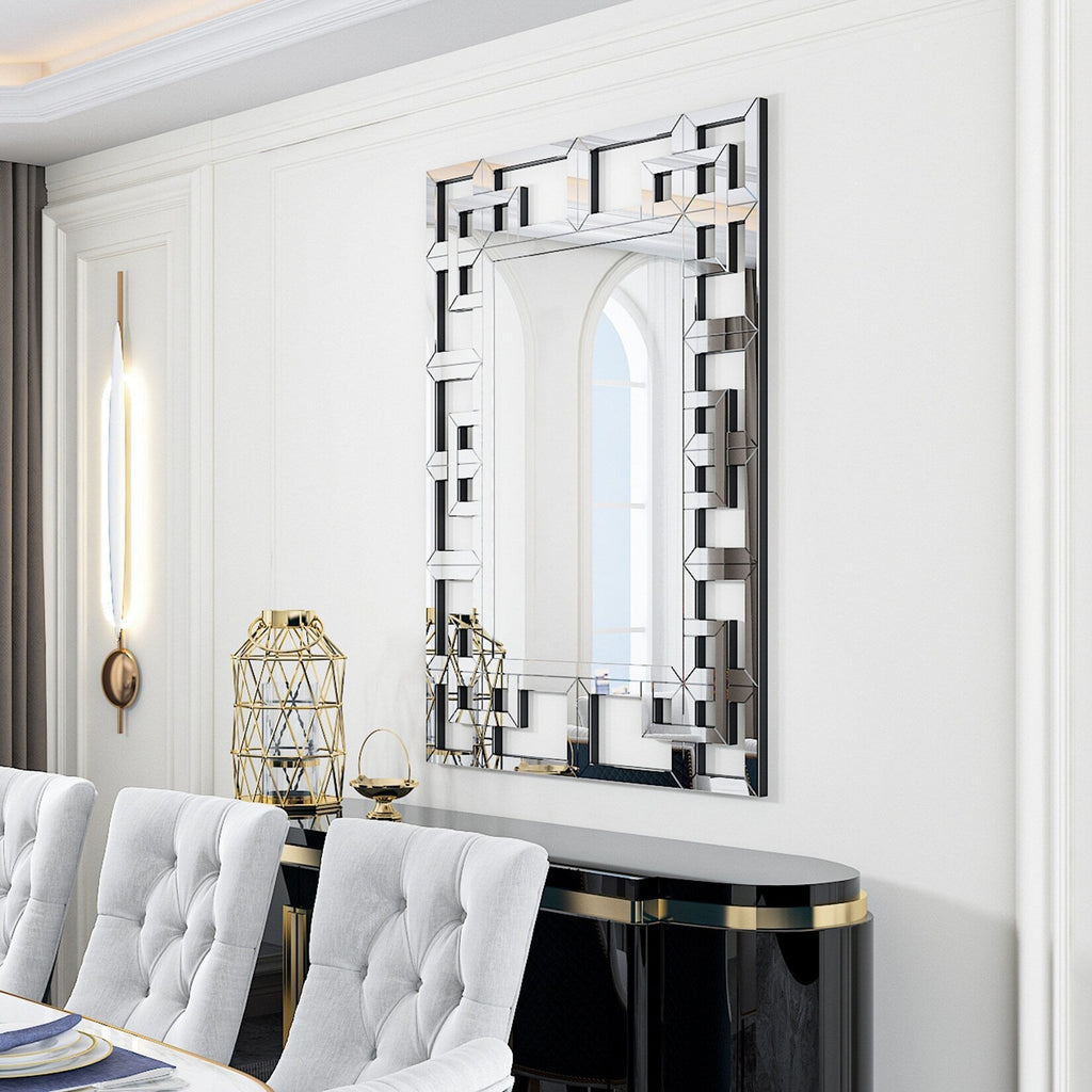 Grand miroir mural décoratif avec cadre géométrique aux accents argentés