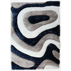 Tapis à poils longs Mateos au design abstrait