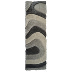 Tapis à poils longs Mateos au design abstrait