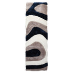 Tapis à poils longs Mateos au design abstrait