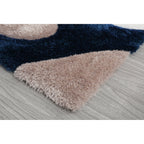 Tapis à poils longs Mateos au design abstrait