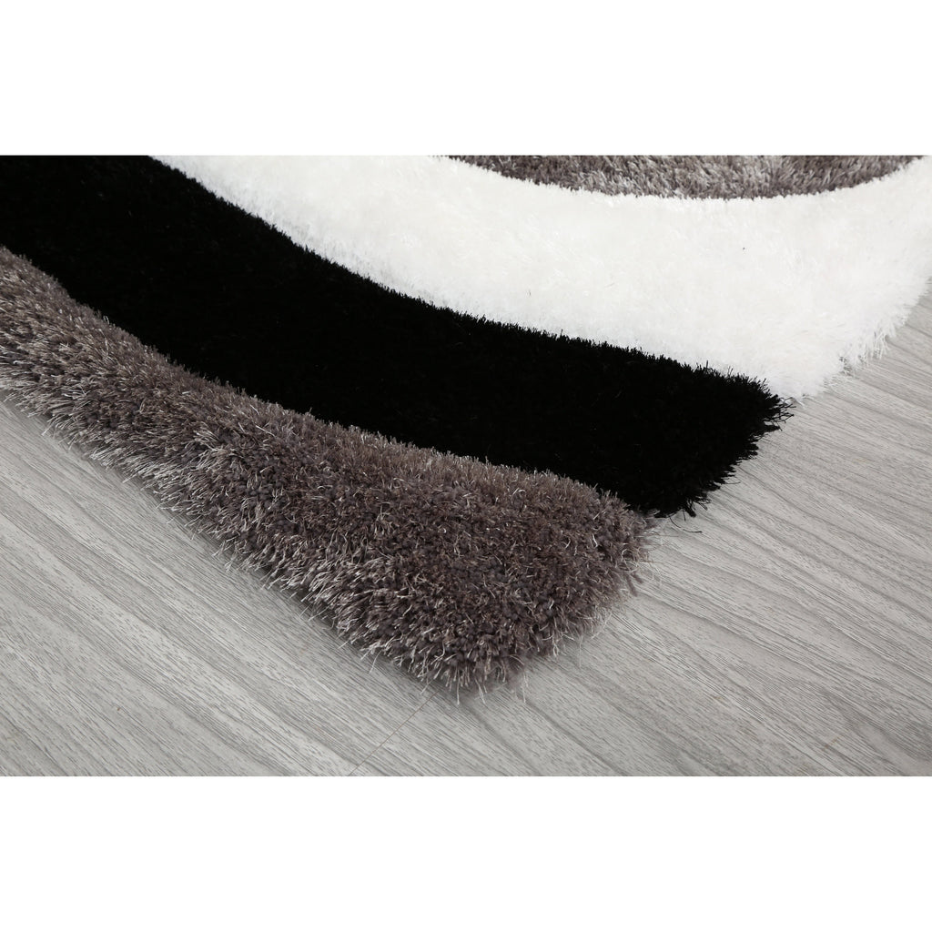 Tapis à poils longs Mateos au design abstrait