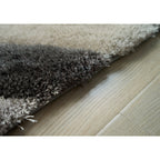 Tapis à poils longs Mateos au design abstrait