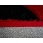 Tapis à poils longs Mateos au design abstrait
