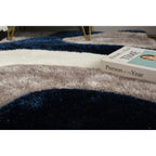 Tapis à poils longs Mateos au design abstrait