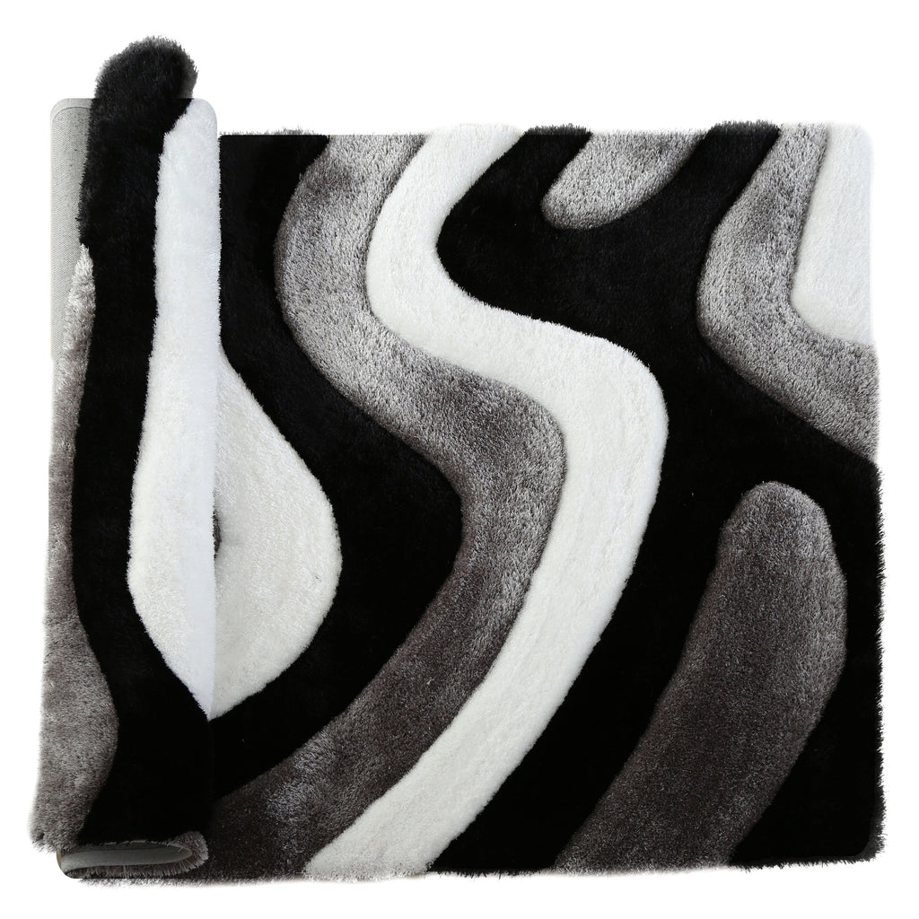 Tapis à poils longs Mateos au design abstrait
