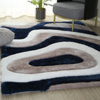 Tapis à poils longs Mateos au design abstrait