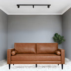 Canapé moderne en cuir véritable avec pieds en bois et coussin traversin supplémentaire