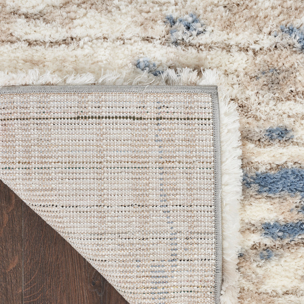Tapis Nourison luxueux à poils longs et ultra moelleux, style abstrait glamour