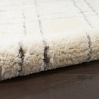 Tapis Nourison luxueux à poils longs et ultra moelleux, motif géométrique abstrait