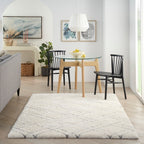 Tapis Nourison luxueux à poils longs et ultra moelleux, motif géométrique abstrait