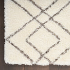 Tapis Nourison luxueux à poils longs et ultra moelleux, motif géométrique abstrait