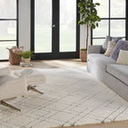 Tapis Nourison luxueux à poils longs et ultra moelleux, motif géométrique abstrait