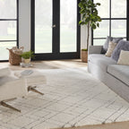 Tapis Nourison luxueux à poils longs et ultra moelleux, motif géométrique abstrait